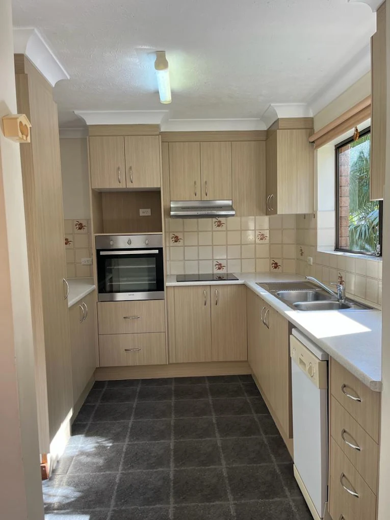 Kitchen cabinetry and oven