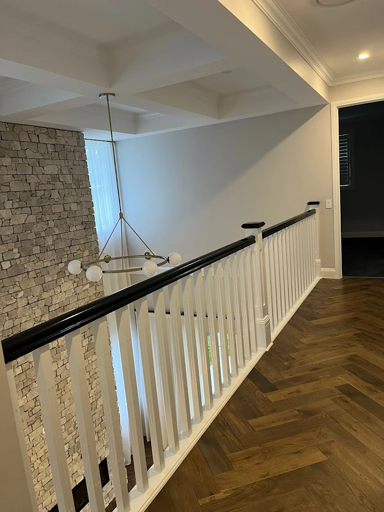 Hallway with stone feature wall